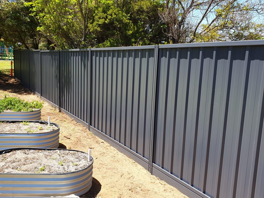 Dark colored colorbond fence in Perth
