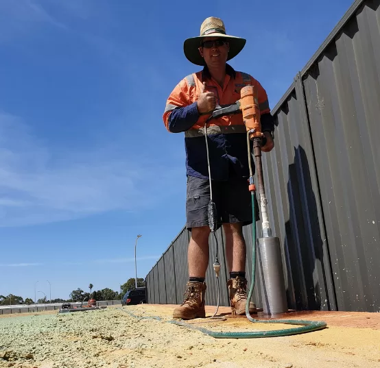 Fencing contractors installing a colorbond fence